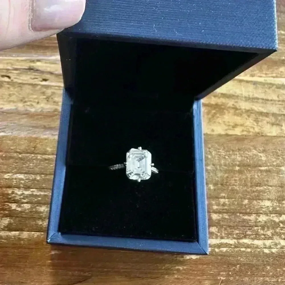 Italo Jewelry Hidden Halo Emerald Cut Engagement and pave band